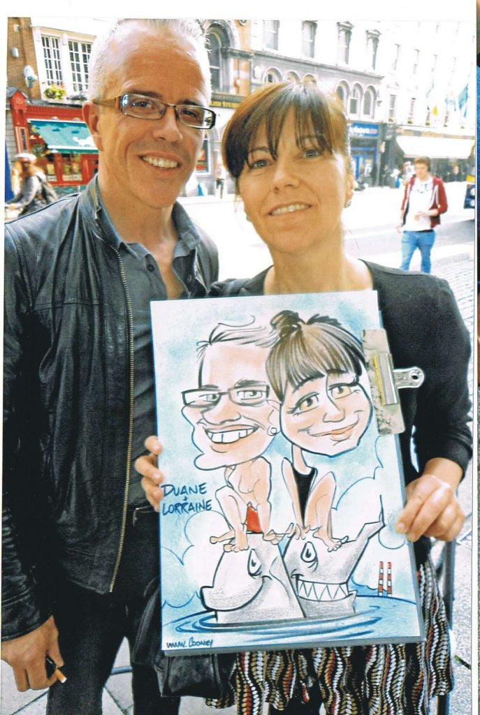 Duane and Lorraine think theres something fishy about their caricature - Green Gallery