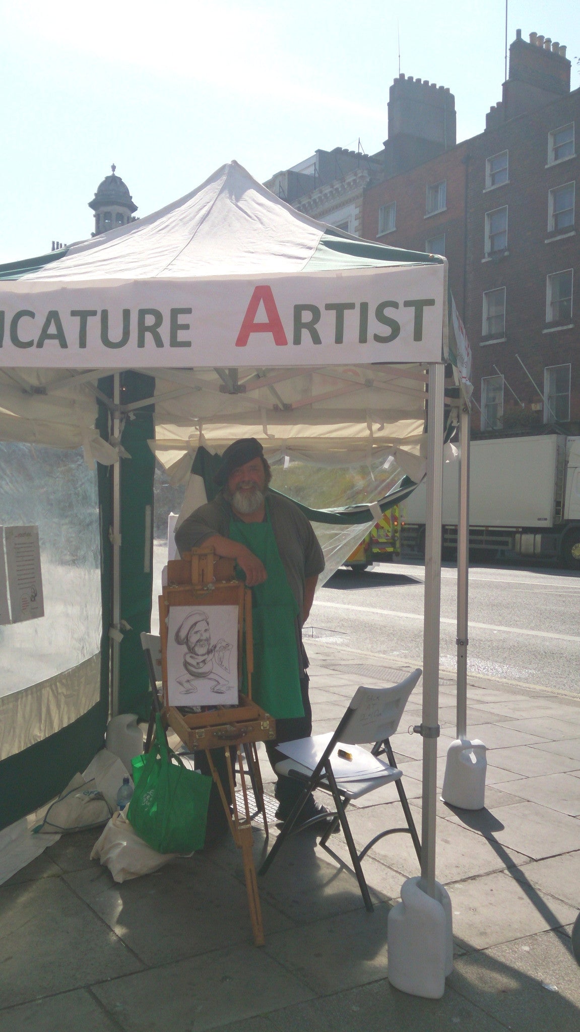 Dan at work at 'Yourface Gazebo' on the corner of Dame Street and Fownes street in Dublin 2 from 10am to 6pm Thursdays through Sundays -weather permitting. - Green Gallery