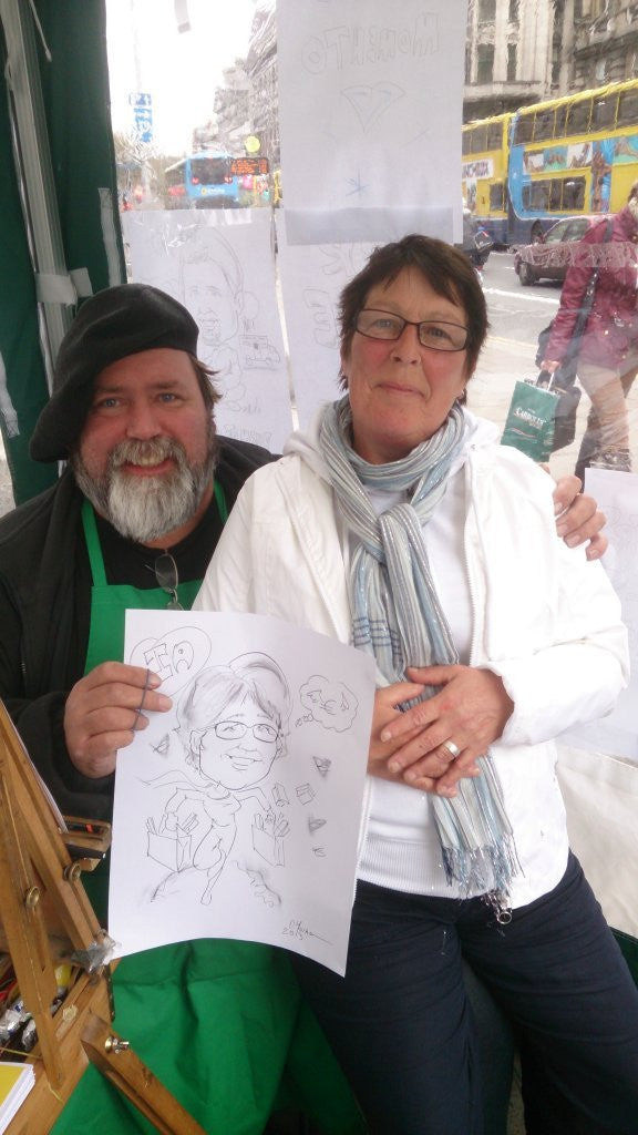 La is delighted with her caricature by Dan Young - Green Gallery